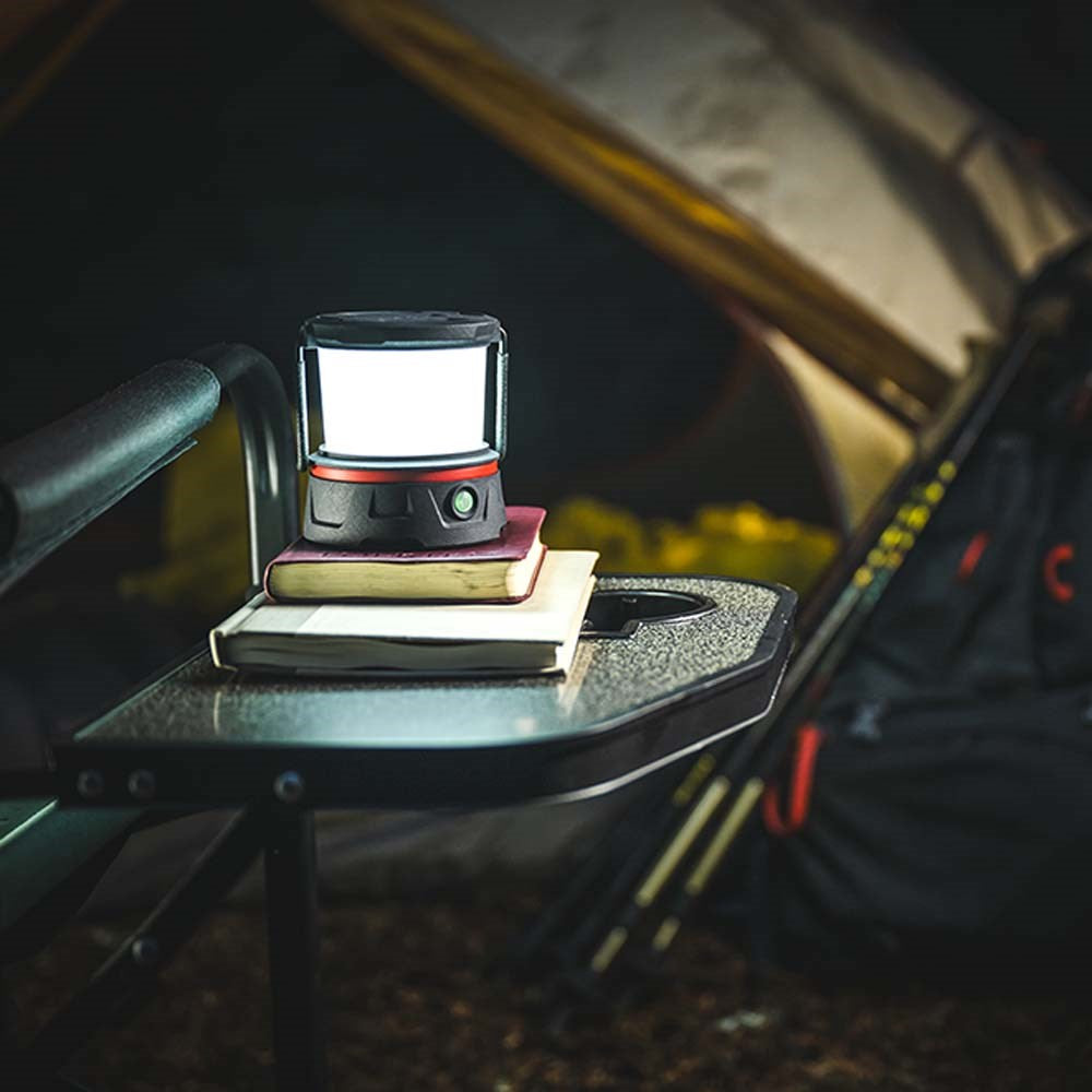 Coast EAL10R LED Lantern - Camping lantern on a table at night